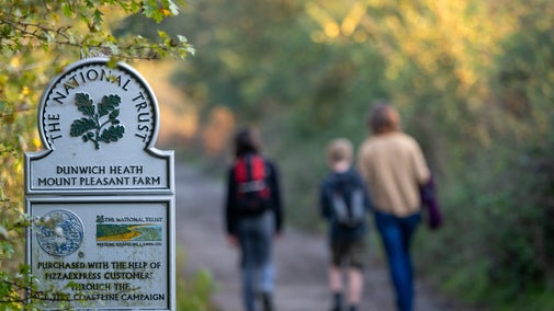 Visitors walking at Dunwich Heath